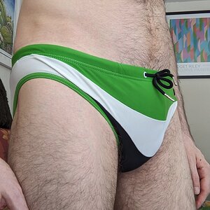 Green and white Speedos